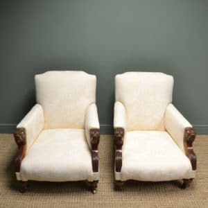 Upholstered Victorian Antique Arm Chairs with carved Lion arms